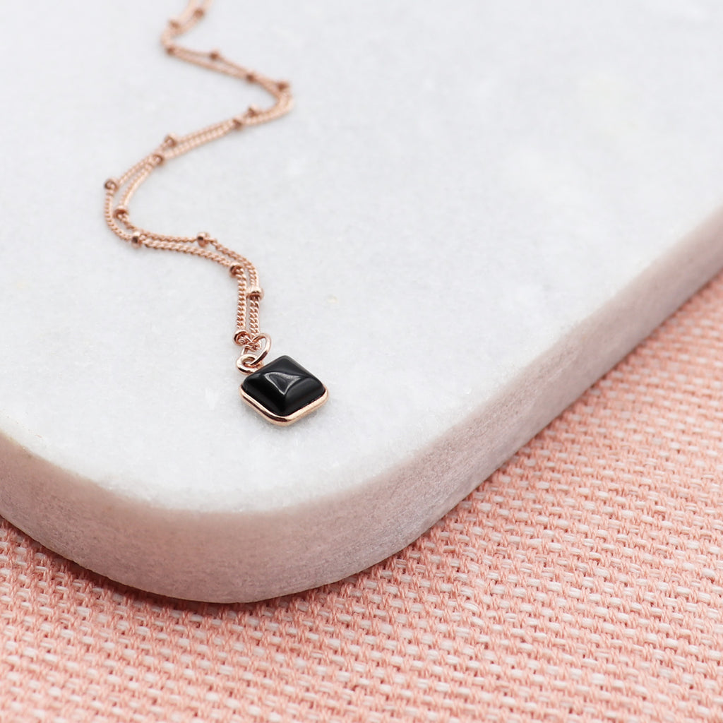 Roseca the black onyx necklace with a rose gold satellite chain