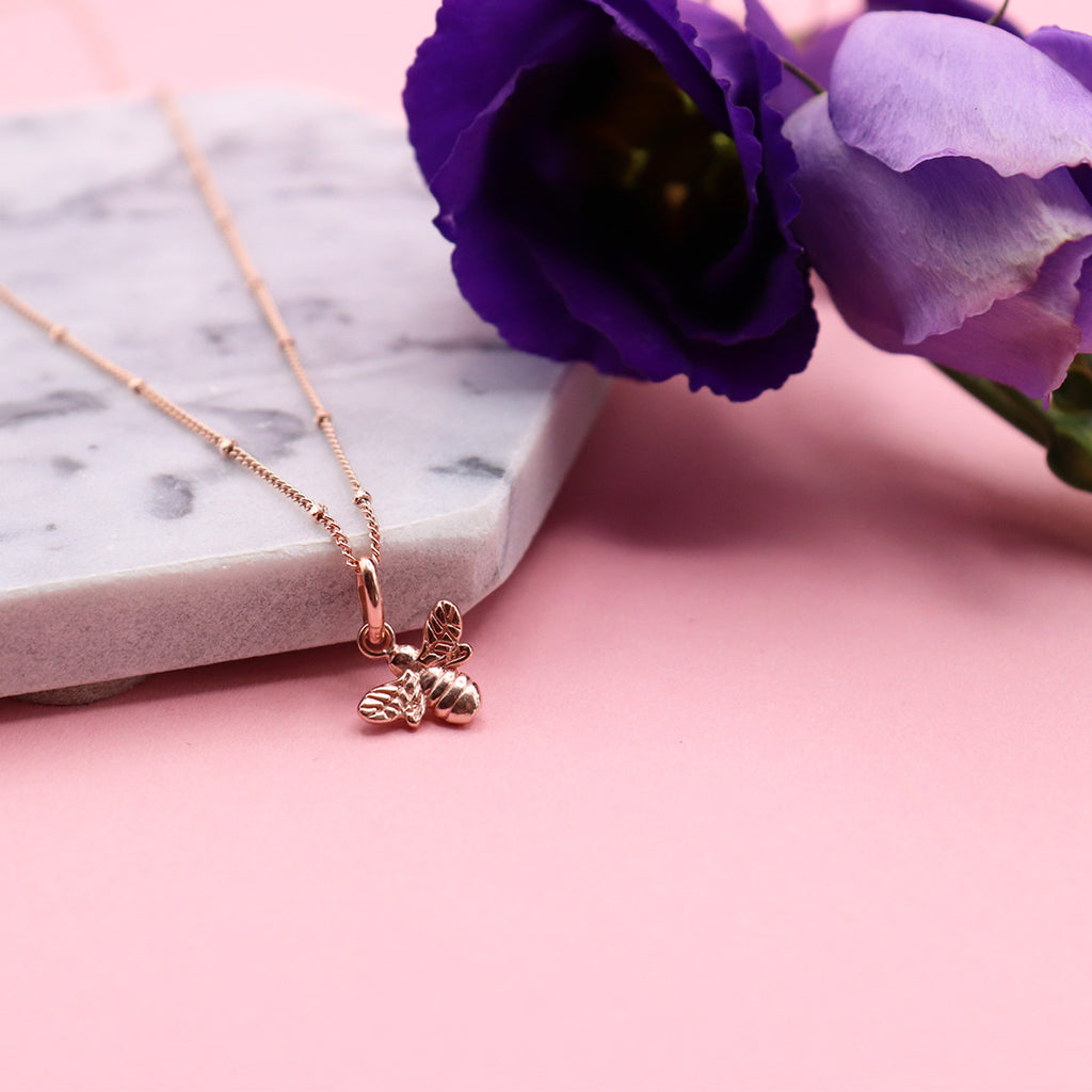 rose gold bee necklace by roseca - sterling silver plated with 18 carat rose gold