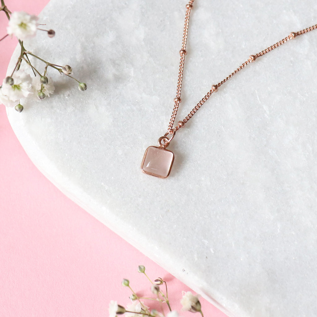 Roseca the rose quartz necklace with a rose gold satellite chain